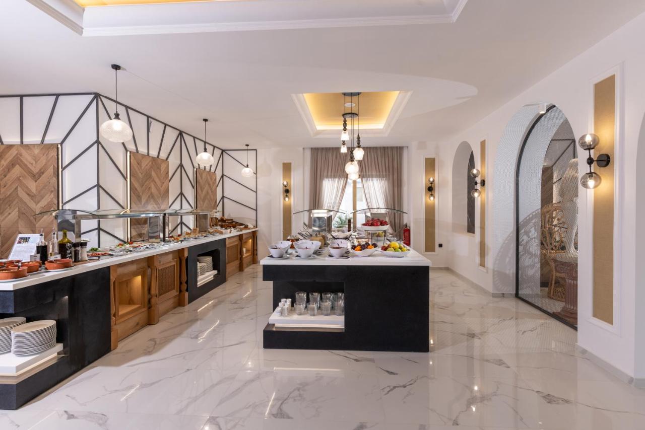 Delfina Boutique Hotel Paralia Kourna Bagian luar foto
