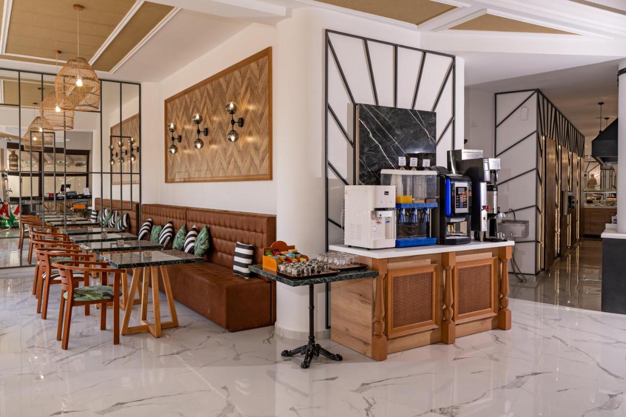 Delfina Boutique Hotel Paralia Kourna Bagian luar foto